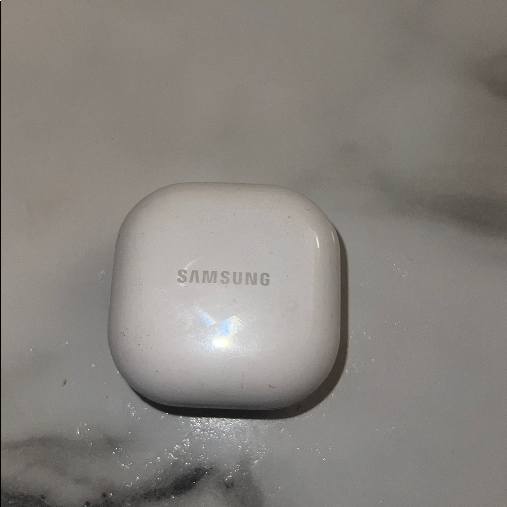 Samsung earbuds case with both earbuds. Model SM-R177